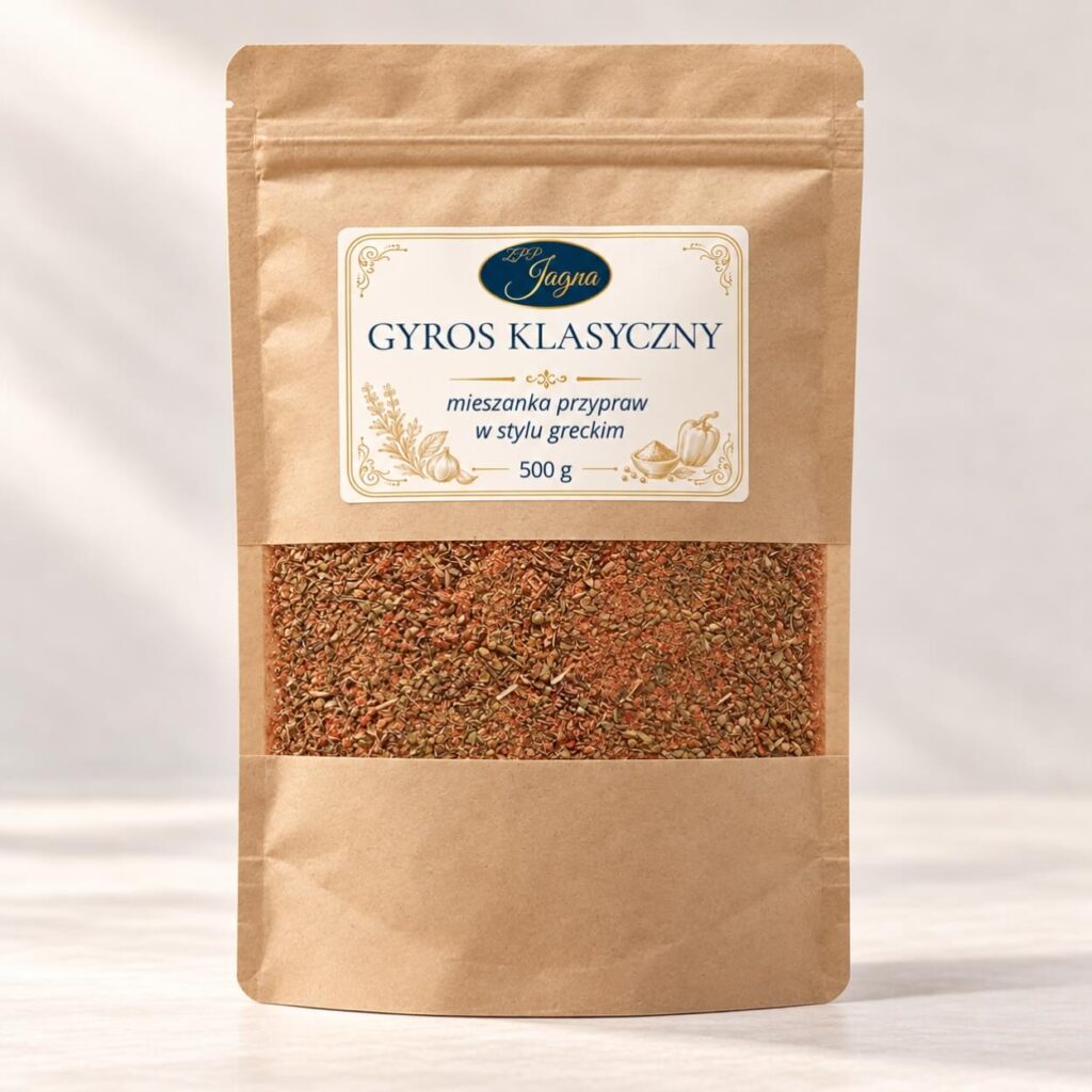 Gyros Klasyczny 500 g ZPP Jagna w opakowaniu kraft z przezroczystym okienkiem, na kremowym tle.